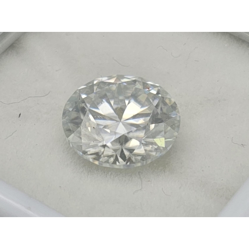 1046 - A 2.5ct Round Brilliant Cut White Moissanite. GLI certified.