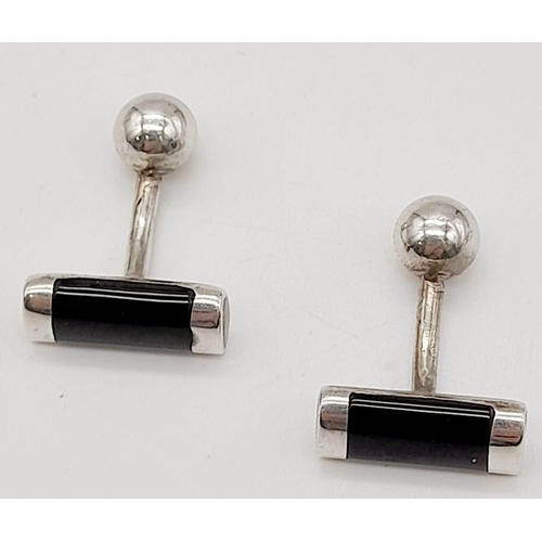 1065 - A Pair of 925 Silver and Onyx Cufflinks. Total Weight 7.59grams