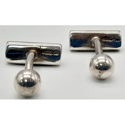 1065 - A Pair of 925 Silver and Onyx Cufflinks. Total Weight 7.59grams