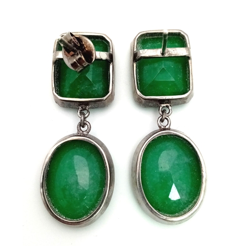 1214 - A Pair of Green Onyx Long Dangle Earrings. Octagonal step cut each with a large oval. Set in 925 Sil... 