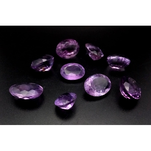 1287 - A 105ct Lot of Natural Amethyst Gemstones. Near Eye-Clean clarity.