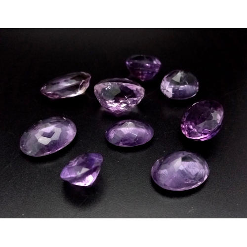 1287 - A 105ct Lot of Natural Amethyst Gemstones. Near Eye-Clean clarity.