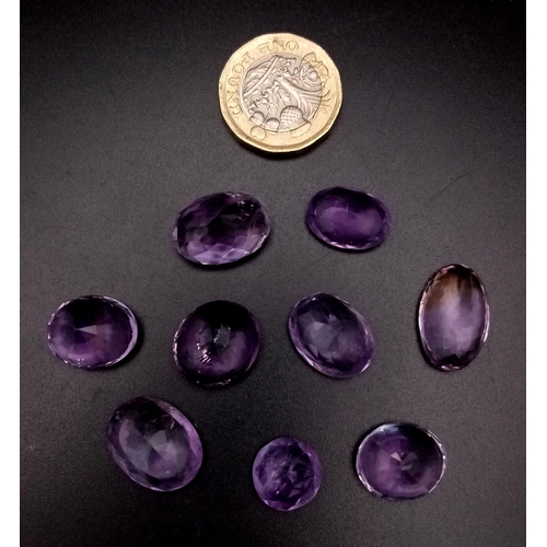 1287 - A 105ct Lot of Natural Amethyst Gemstones. Near Eye-Clean clarity.