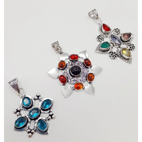 1379 - Three Different Coloured Gemstone Pendants set in White Metal. 6cm - largest pendant.