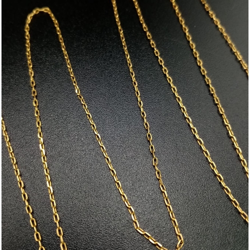 203 - An 18 K yellow gold cross with chain. Cross dimensions: 33 x 18 x 3 mm, chain length: 50 cm, total w... 