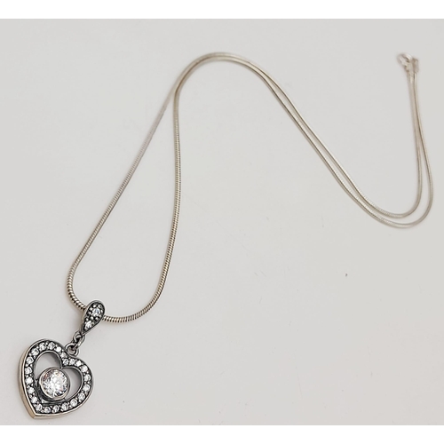 466 - A 925 Silver Necklace with a 925 Silver White Stone Heart Pendant. 22cm and 3cm.