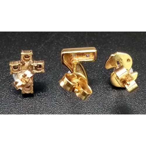 485 - Three 9K Yellow Gold and Diamond Single Stud Earrings. A number 7, cross and dollar sign. 1.61g tota... 