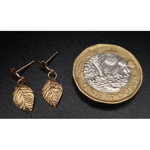 489 - Two 9K Yellow Gold Pairs of Earrings. Both floral design. 0.72g.