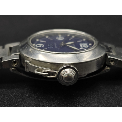 614 - A stainless steel Pasha de Cartier watch. 35 mm case with blue dial, automatic movement and Cartier ... 