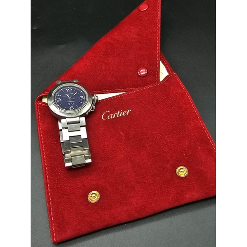 614 - A stainless steel Pasha de Cartier watch. 35 mm case with blue dial, automatic movement and Cartier ... 