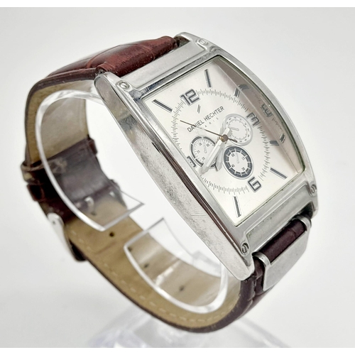 783 - A DANIEL HECHTER - PARIS gents watch. Stainless steel case  45 x 35 mm, silver tone dial with three ... 