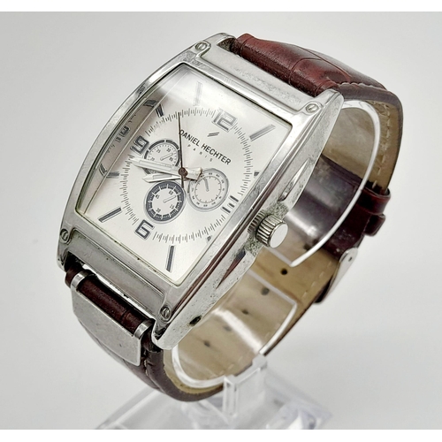 783 - A DANIEL HECHTER - PARIS gents watch. Stainless steel case  45 x 35 mm, silver tone dial with three ... 