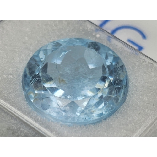 808 - A 9.80ct Round Brilliant Blue Topaz Gemstone. Comes with AIG Milan Certification - Sealed Blister Pa... 