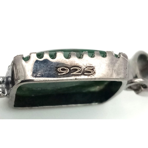 885 - A Green and White Agate Pendant. Set in 925 Sterling silver.  12.3g total weight. Comes in a present... 