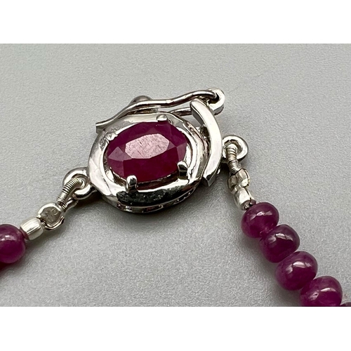 1108 - A 165ct Ruby Small Rondelle Gemstone Necklace with Ruby and 925 Silver clasp. 44cm.