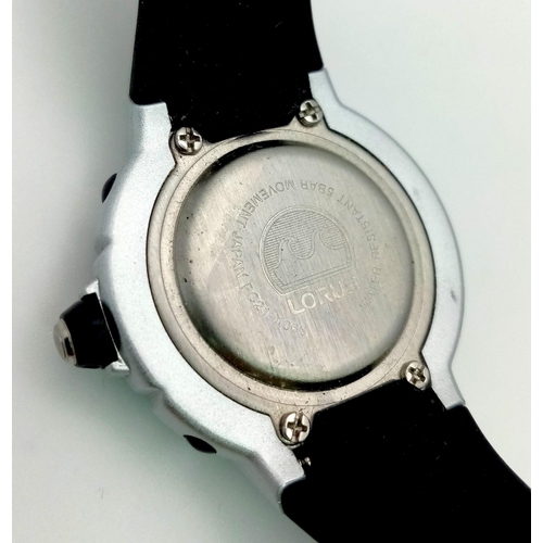 1148 - A stainless steel LORUS  watch. 33 mm case, calibrated bezel, black dial with white numerals and lum... 