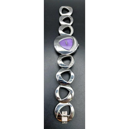 1169 - A stainless steel SECONDA SEKSY ladies watch. 33 mm case with triangular purple dial and silver tone... 