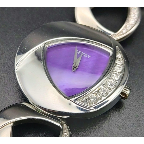 1169 - A stainless steel SECONDA SEKSY ladies watch. 33 mm case with triangular purple dial and silver tone... 