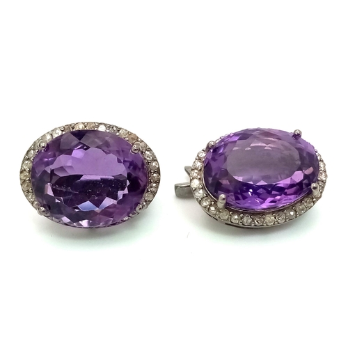 536 - An Amethyst Gemstone Ring with a Matching Pair of Stud Earrings. Both with Diamond Accents. All set ... 