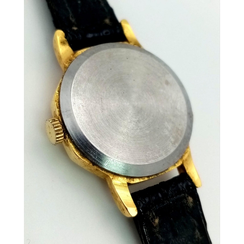 1141 - A MONTINE ladies watch. 22 mm gold plated case with gold tone dial, hour marks and hands, quartz mov... 