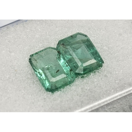 1249 - A 1.19ct Zambian Emerald Gemstone Pair in a Sealed Blister Pack. AIG Milan Certified. Oval Shape. Lo... 