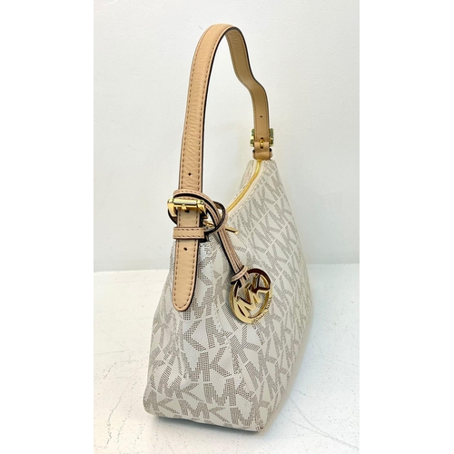 855 - Michael Kors Cream Monogram Bag with Gold Tone Hardware. 19cm x 31cm x 12cm.