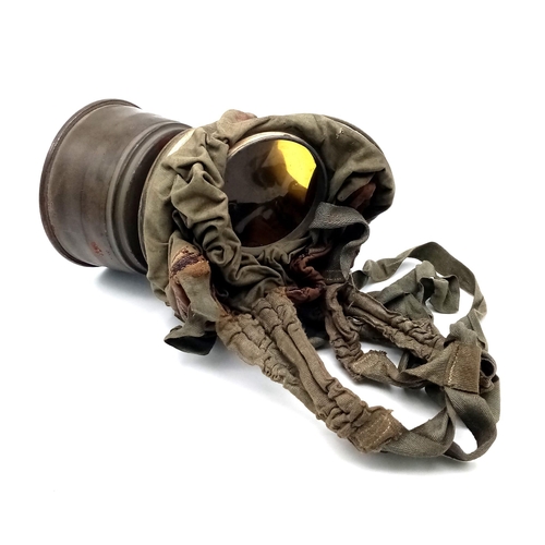 171 - An Original 1917 WW1 German Imperial Gas Mask with Carrying Tin. Markings for 1917. In a good (trenc... 