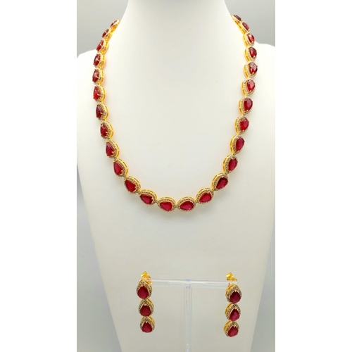 46 - A Pear-Cut Ruby Gemstone Tennis Necklace (42cm) with a Halo of Diamonds in a Pave Setting. Set in 92... 