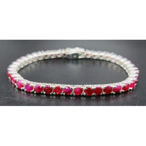 886 - A Ruby Gemstone Tennis Bracelet set in 925 Silver. 20cm.