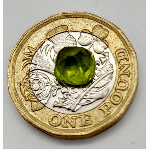 987 - A 2.24ct Cushion Cut Olive-Green Peridot with GGI Certification. An earth-mined gem of Pakistan orig... 