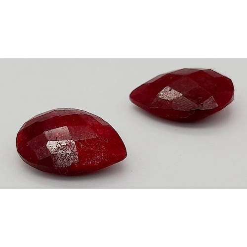 829 - A Pair of 13.25ct of Faceted Natural Ruby, in Pear Shapes. Comes with a GLI Certificate.