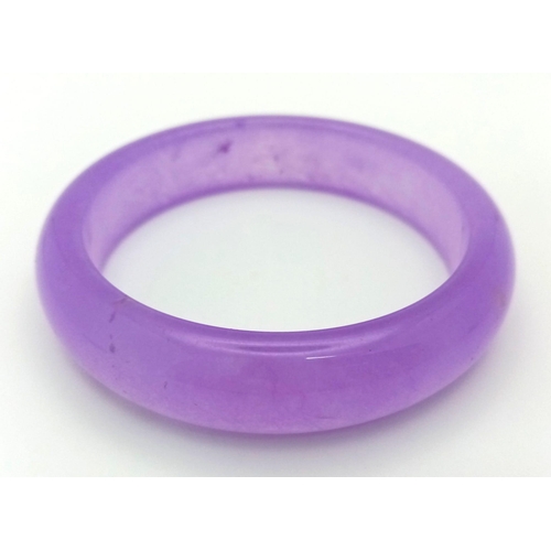 880 - A Beautiful Summer Lavender Jade Bangle. 6cm inner diameter. 2cm width