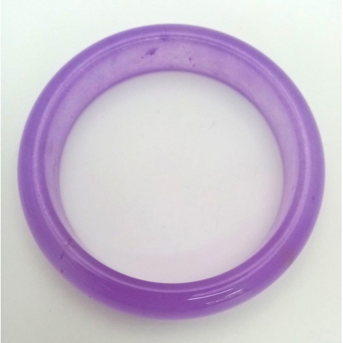 880 - A Beautiful Summer Lavender Jade Bangle. 6cm inner diameter. 2cm width