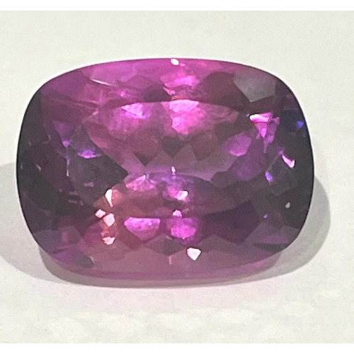 895 - A 20ct Rectangular-Cut Raspberry Garnet Gemstone. Wonderful colour-play and light refraction. No vis... 