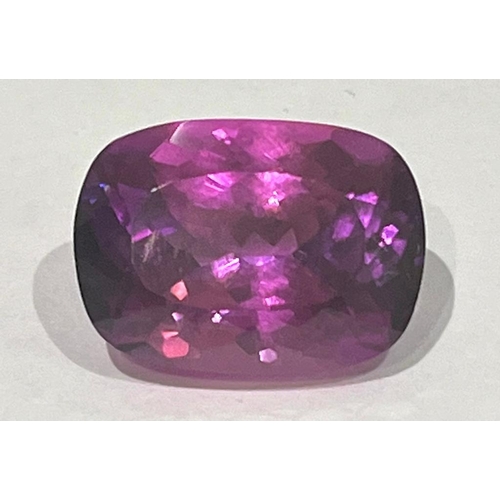 895 - A 20ct Rectangular-Cut Raspberry Garnet Gemstone. Wonderful colour-play and light refraction. No vis... 