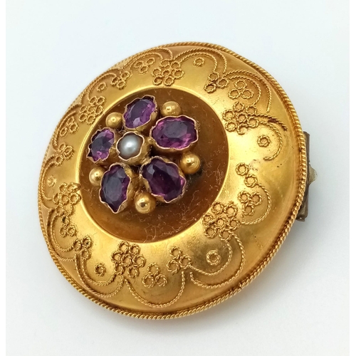 1266 - A Victorian High-Karat Gold (tested) Garnet and Split Pearl Memorial Brooch. Cannetille bead-work an... 