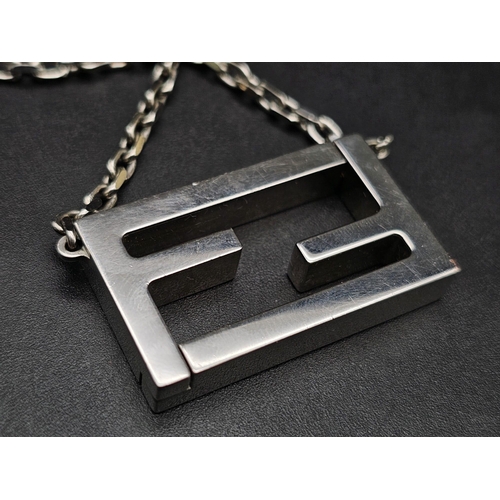 339 - A Fendi Logo White Metal Magnetic Pendant and Chain. 3.5cm and 44cm. Comes in a Fendi box. Ref: 1242... 