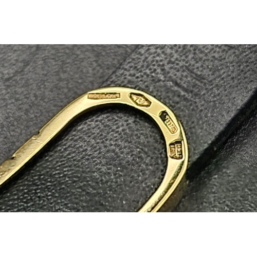 101 - A Bulgari Perentesi 18K Gold and Black Leather Bracelet. Comes in a Bulgari presentation case (worn ... 