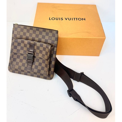 115 - A Louis Vuitton Canvas Messenger Bag with Dust Cover and LV Box. Shoulder strap. Monogram LV canvas.... 