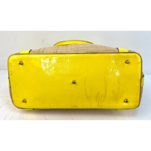 1157 - An Anya Hindmarch Patent Yellow Leather and Straw Small Tote Bag. Exterior magnetic pocket. Textile ... 