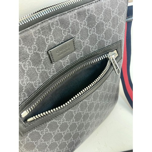 375 - A Gucci GG Black Medium Messenger Bag. Black/Grey supreme monogram canvas. Blue and red web strap. P... 