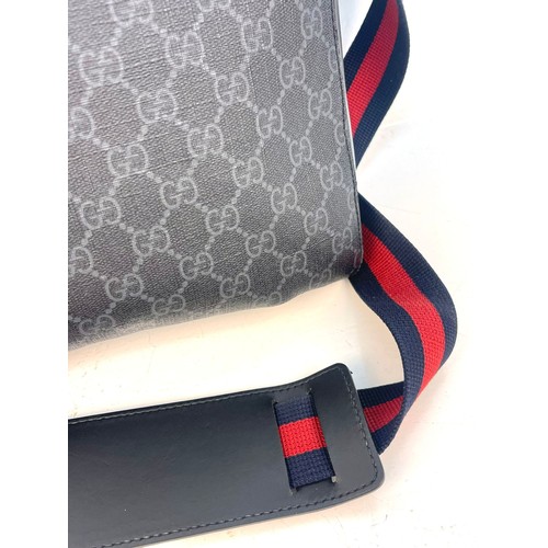 375 - A Gucci GG Black Medium Messenger Bag. Black/Grey supreme monogram canvas. Blue and red web strap. P... 