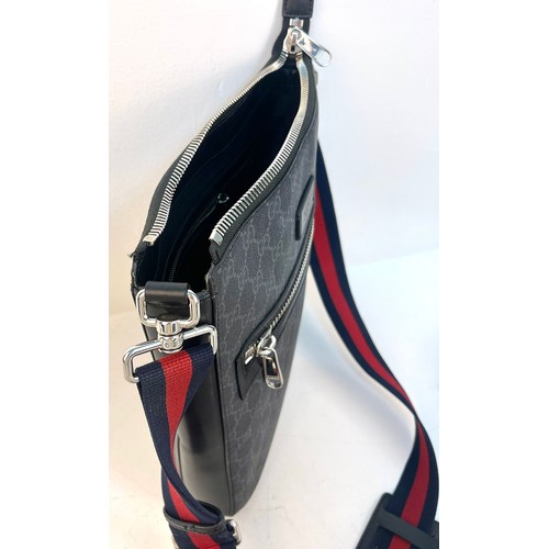 375 - A Gucci GG Black Medium Messenger Bag. Black/Grey supreme monogram canvas. Blue and red web strap. P... 