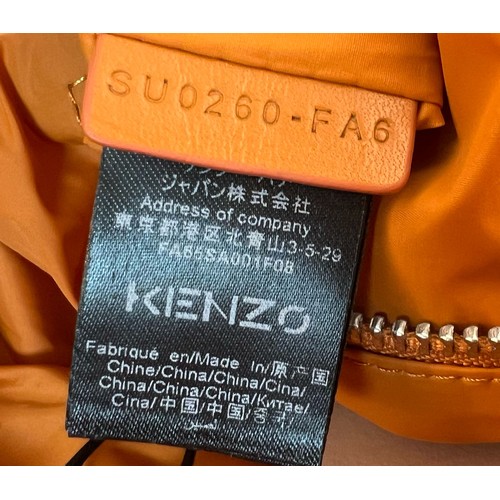 529 - A Kenzo Orange Costanza Puff Bag. Clip top button opening.
Shoulder strap. Dustcover. Interior zippe... 