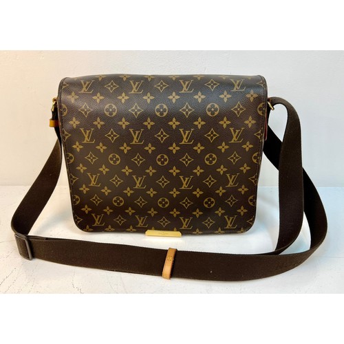 122 - A Louis Vuitton Large Flap Shoulder Bag and Dust Cover. LV monogram canvas. Gold-tone hardware. Thic... 