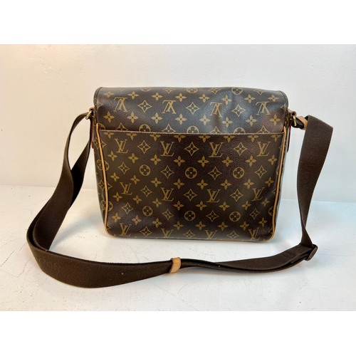 122 - A Louis Vuitton Large Flap Shoulder Bag and Dust Cover. LV monogram canvas. Gold-tone hardware. Thic... 