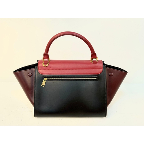 1074 - A Celine Tri Colour Leather Medium Tapeze Top Handle Bag. 24 x 16 x 30cm. In good condition but plea... 