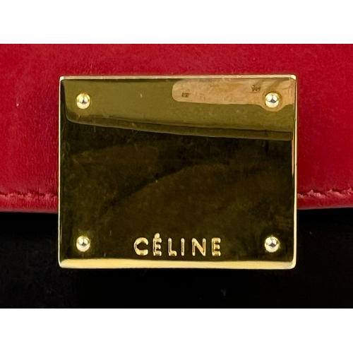 1074 - A Celine Tri Colour Leather Medium Tapeze Top Handle Bag. 24 x 16 x 30cm. In good condition but plea... 