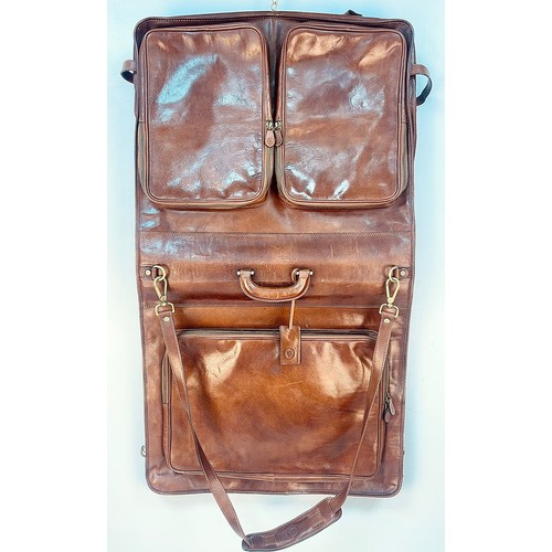 515 - A Beautiful Hand-Made Maxwell Scott Rovello Tan Leather Suit Luggage Bag. Solid gold-tone exterior h... 