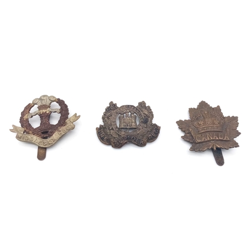 1031 - Three Original Vintage Military Badges: Canada General Service, The Suffolk Regiment (no pin) and Th... 